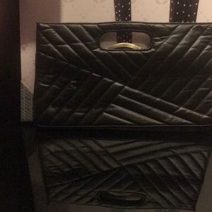 Long clutch handheld with chain strap
